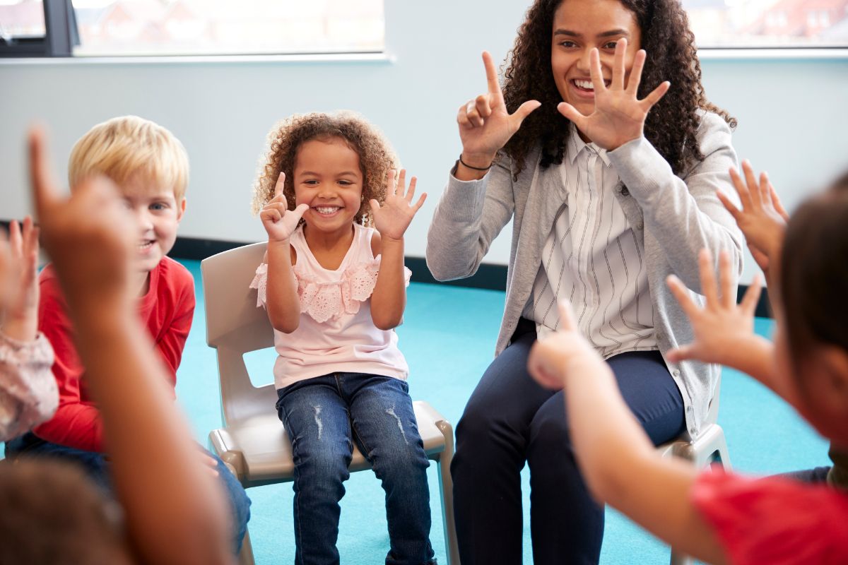 Keep IN Learning - New Teacher Support blog a teacher in a circle with a group of students practicing counting
