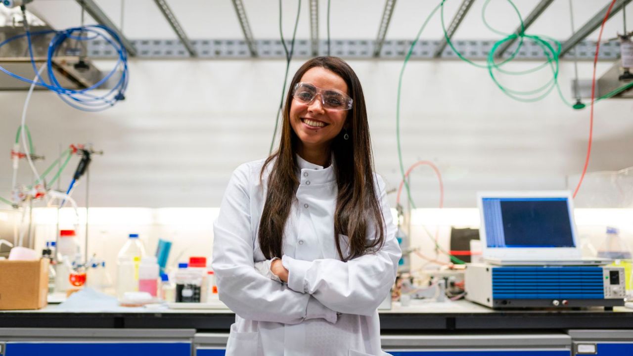 female engineer in front of her workspace