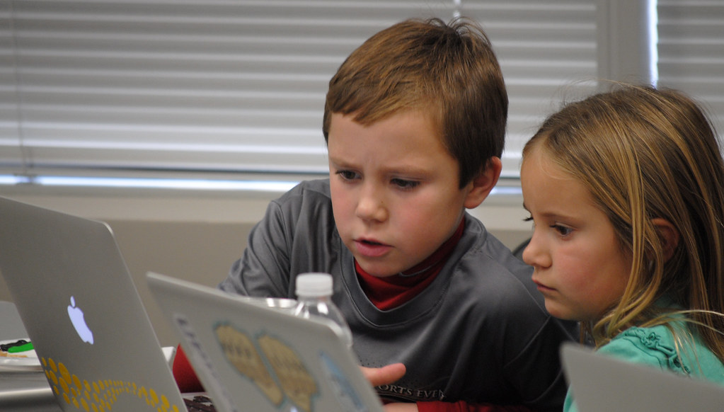 children working on a computer