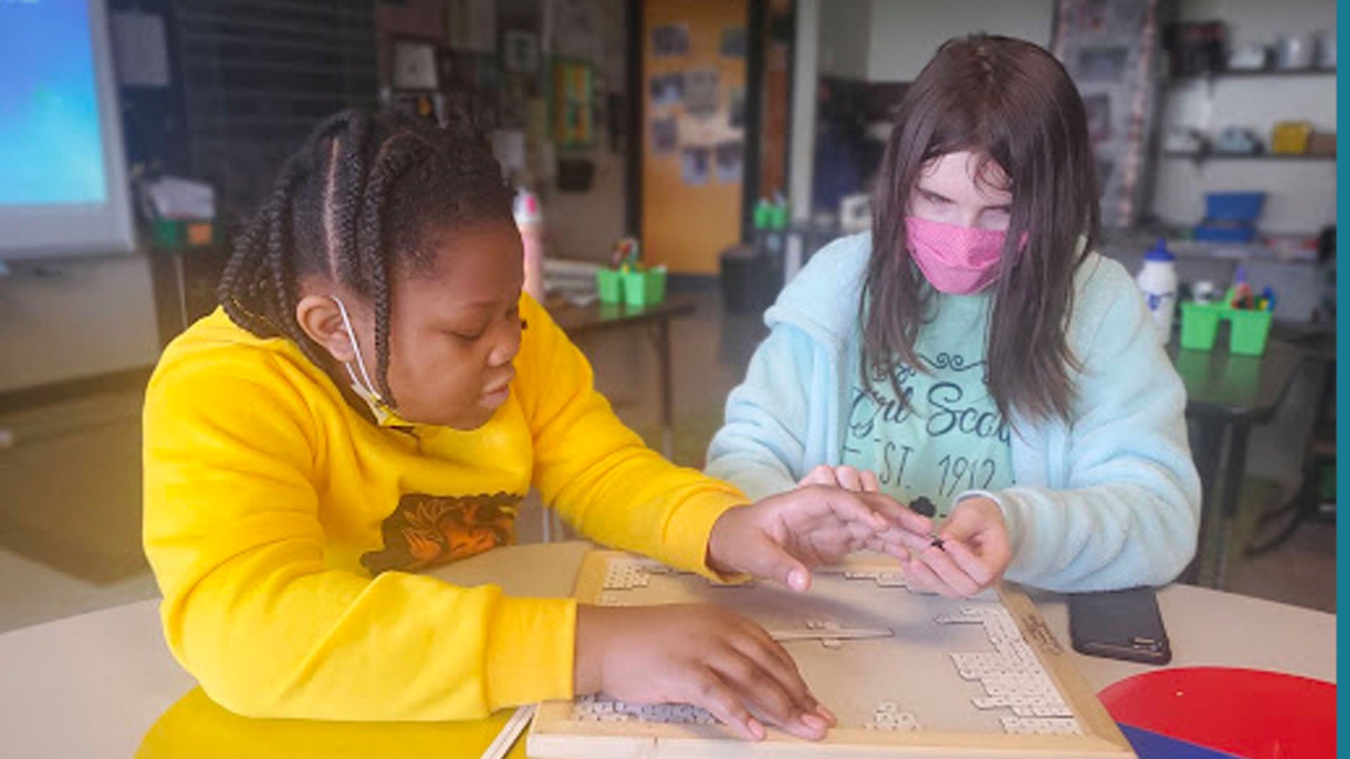 Visually Impaired Students Working Together students learning together