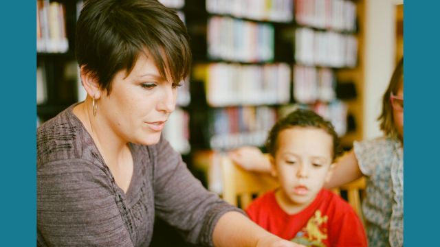 Librarian reading to students