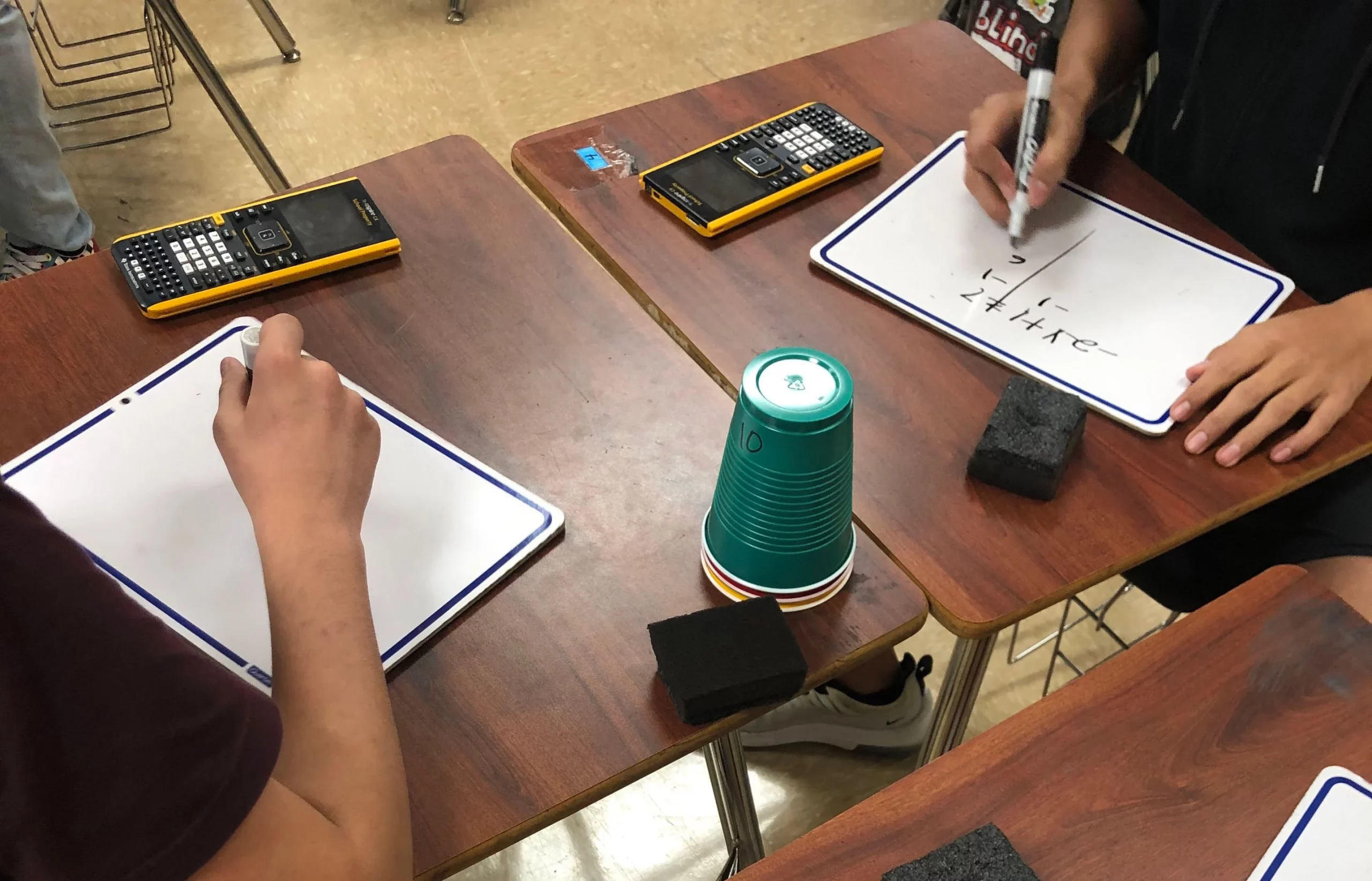 Edutopia- A Strategy for Boosting Student Engagement in Math desks with school supplies on them