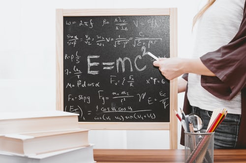 Howie Hua Picture chalk board with math equation on it