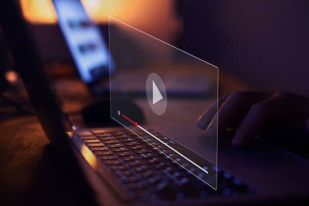 streaming online, watching video on internet, live concert, show or tutorial picture of computer