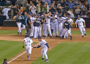 baseball team celebrating at home base