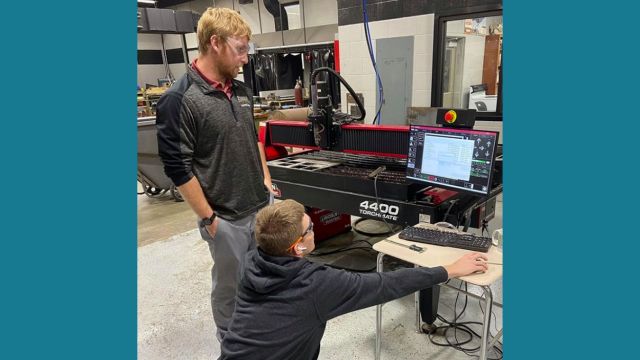 students working at a computer