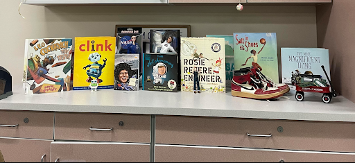 books lined up on a countertop