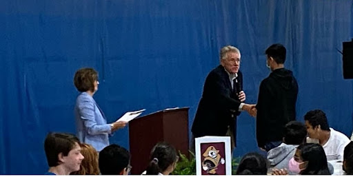 Mayor shaking hands Mayor shaking hands with a sixth grade student.