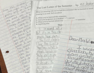 Writing on sheets of paper.