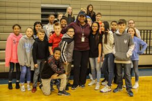 Teacher with a group of students.
