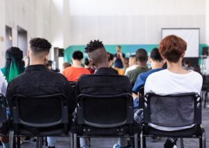 Students sitting in a classroom.
