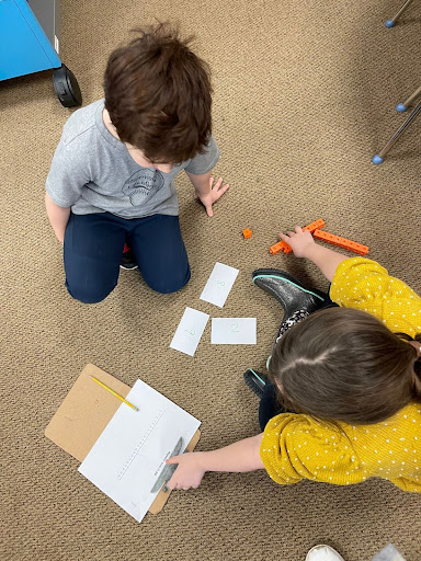 Two students working together.