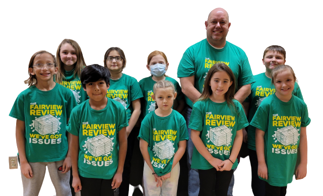 Teacher and students posing for a picture.