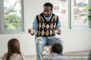 Teacher talking to students.